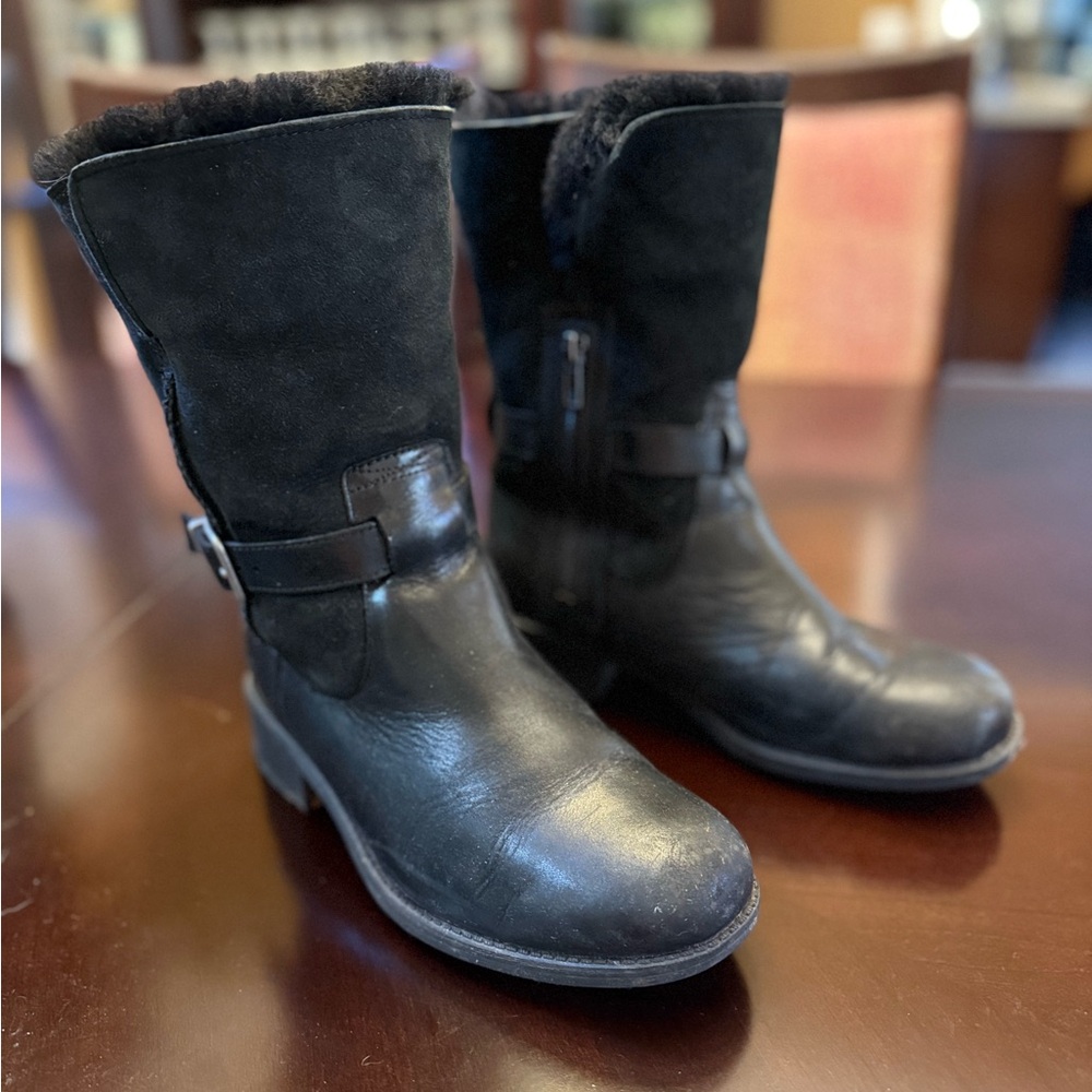 Ugg Leather fleece-lined boots.
